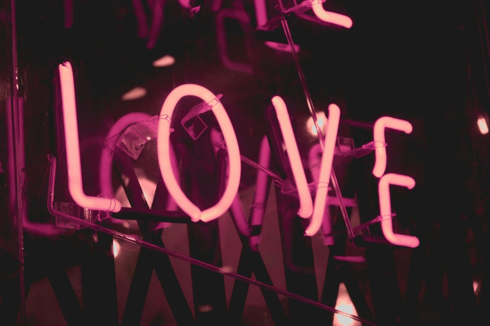 Credit: Unsplash LED lights spelling out LOVE